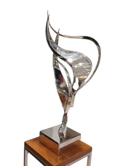 Leonardo Nierman escultura original acero inoxidable abstracto plata brillo arte mexicano inversion