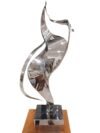 Leonardo Nierman escultura original acero inoxidable abstracto plata brillo arte mexicano inversion