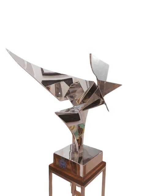 Leonardo Nierman escultura original acero inoxidable ave geometrica abstracto pulido espejo