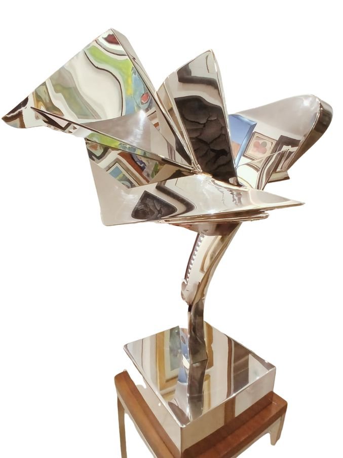 Leonardo Nierman escultura original acero inoxidable ave geometrica abstracto pulido espejo